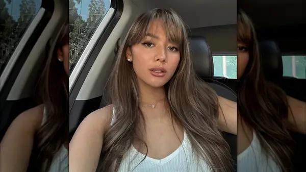 Woman with wispy bangs