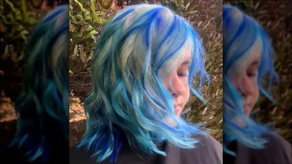 Medium white hair with blue lowlights