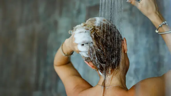 Shampooing in shower