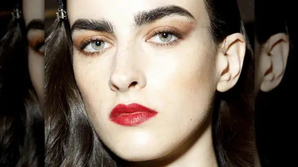 Woman with full eyebrows 