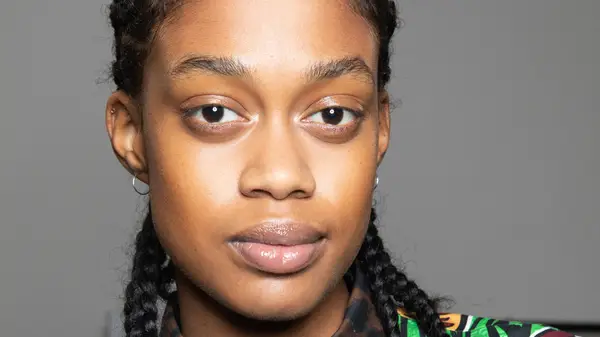 Woman with full eyebrows 