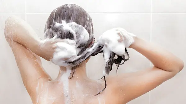 Woman washing her hair 