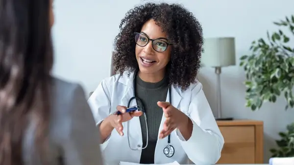 Person talking to a doctor