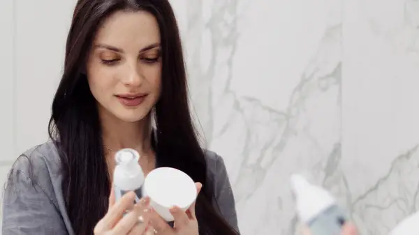 Woman looking at beauty products