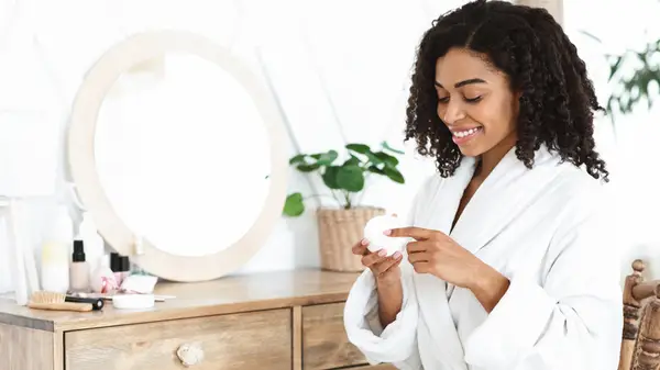 Woman looking at beauty products