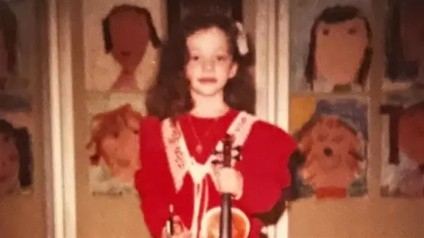 Kat Dennings as a child