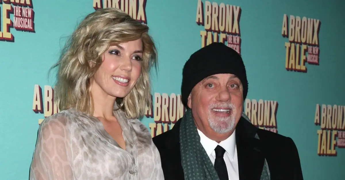 Alexis Roderick und Billy Joel auf dem roten Teppich