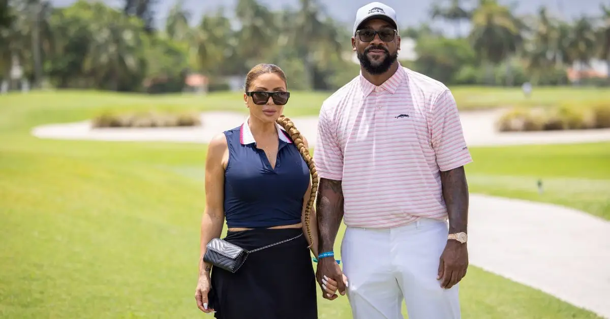 Larsa Pippen e Marcus Jordan em um campo de golfe