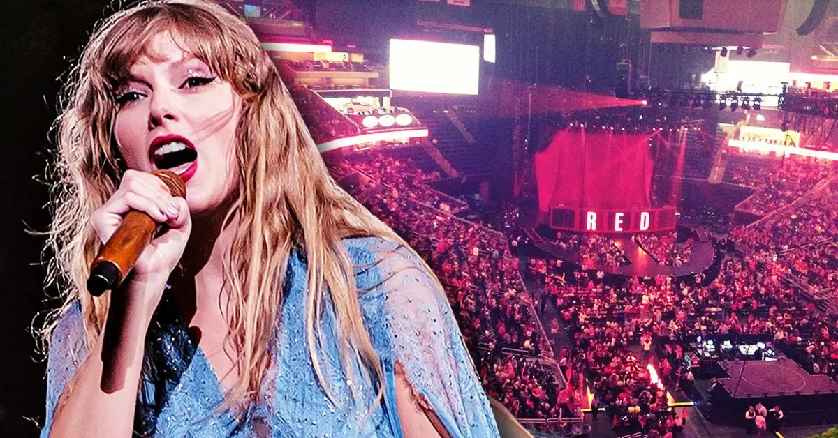 Taylor Swift amb vestit blau a la gira vermella