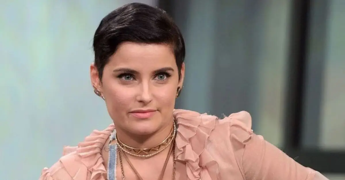 Nelly Furtado-fans blev förvånade över att få veta att hennes babypappa fortfarande jobbar i branschen