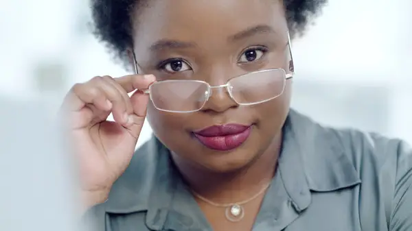Woman wearing rectangular glasses