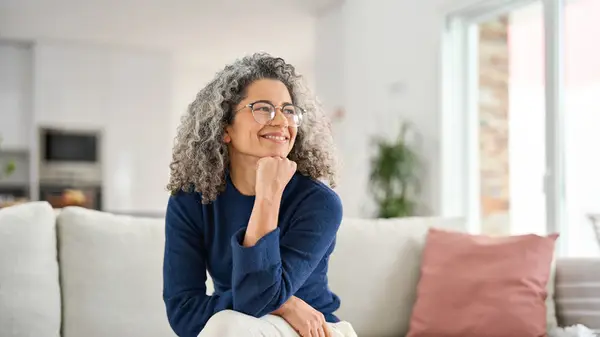 Older woman wearing reading glasses