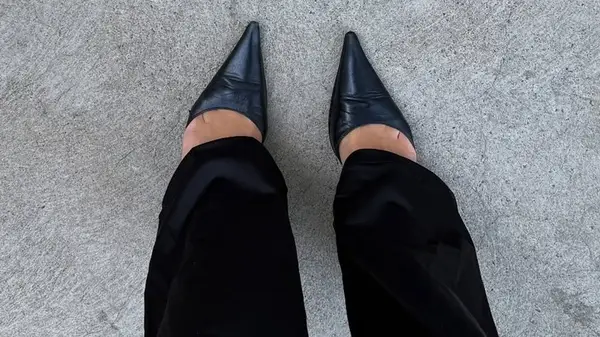 A woman in super pointed toe heels