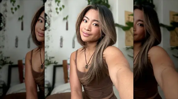 A woman with a glossy blowout