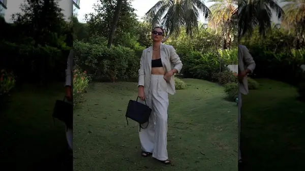 slouchy linen suit black accessories