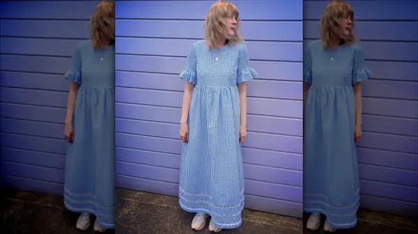 Woman in gingham dress