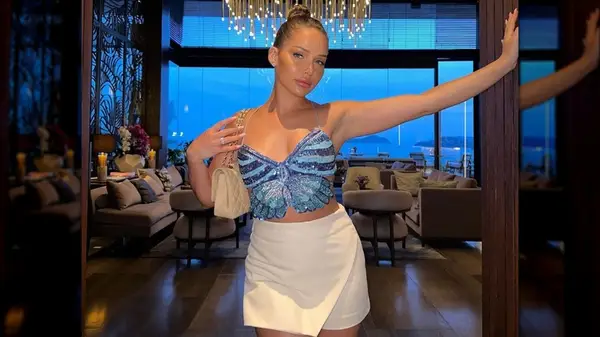 Woman in butterfly top, skorts