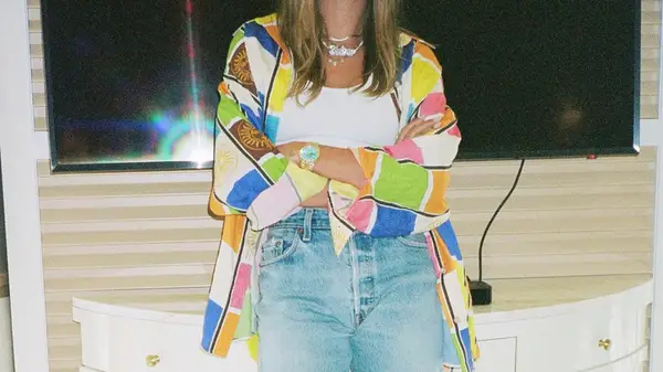 Hailey Bieber posing in Instagram post with grainy filter