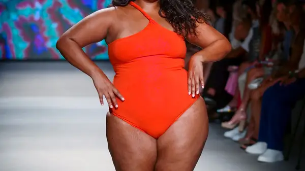 plus size woman in swimsuit