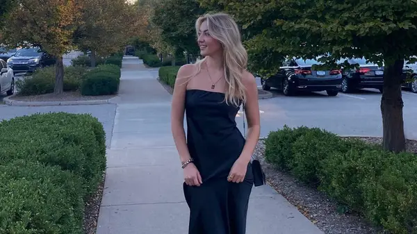 woman wearing black slip dress