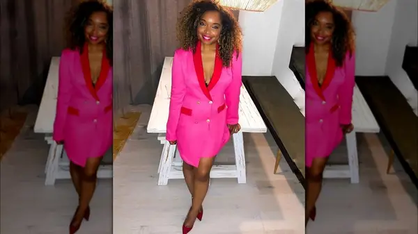 Woman wearing pink blazer dress
