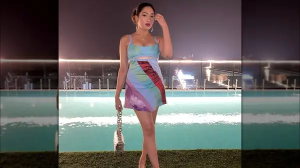 woman in Jenna Rink costume