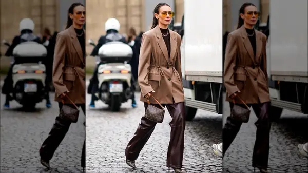 A woman in leather pants 