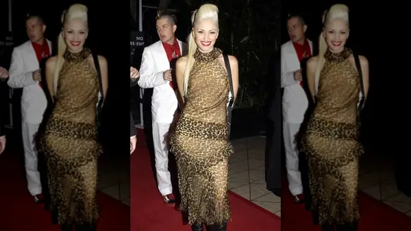 Gwen Stefani on the red carpet and wearing a sheer leopard-print dress