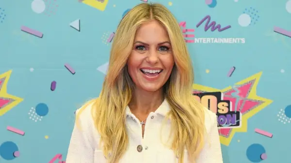 Candace Cameron Bure smiling on the red carpet