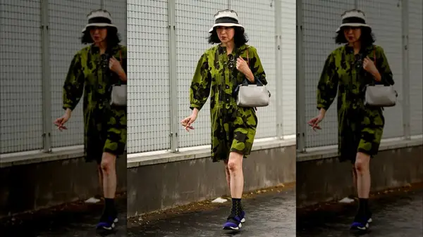 A woman in a camo dress 