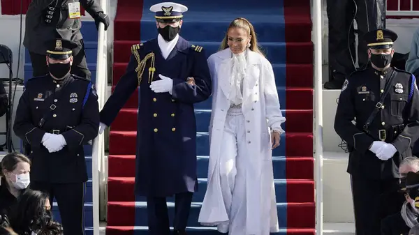 Jennifer Lopez in a white suit at Joe Biden