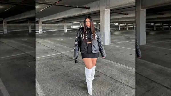 Woman in a moto jacket