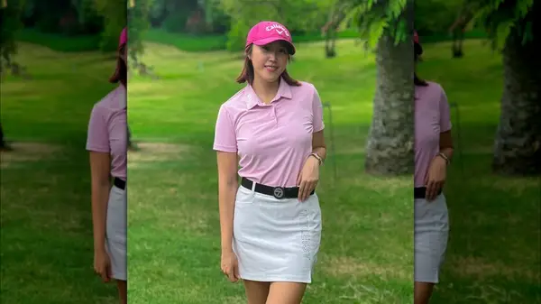 Woman in a golf outfit