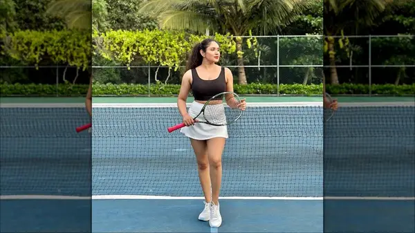 Woman wearing tenniscore fashion