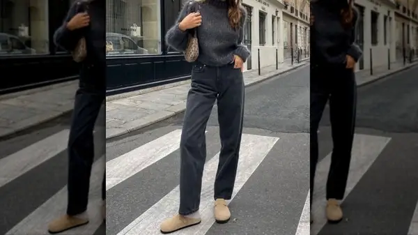 A woman wearing dark jeans