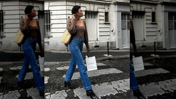 A woman in black jeans