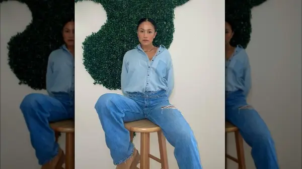 A woman wearing double denim