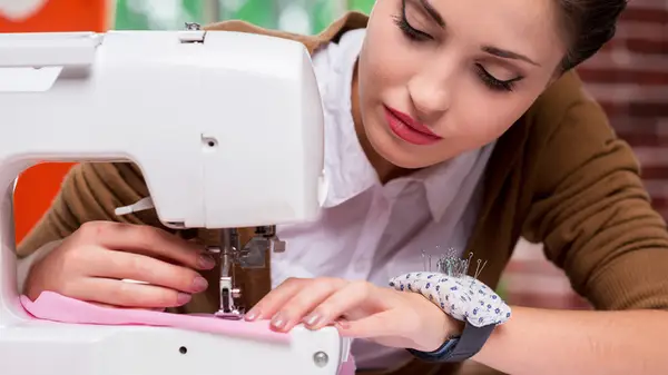 woman with sewing machine