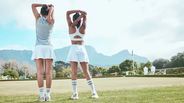 Women wearing tennis skirts