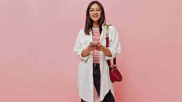 Woman wearing oversized button down