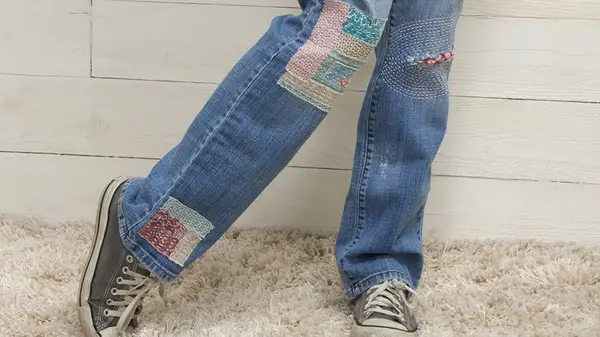 Some visibly mended jeans