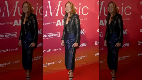 Sophie Grégoire Trudeau at the Billboard Canada Women in Music awards in 2024 in a blue dress and black jacket