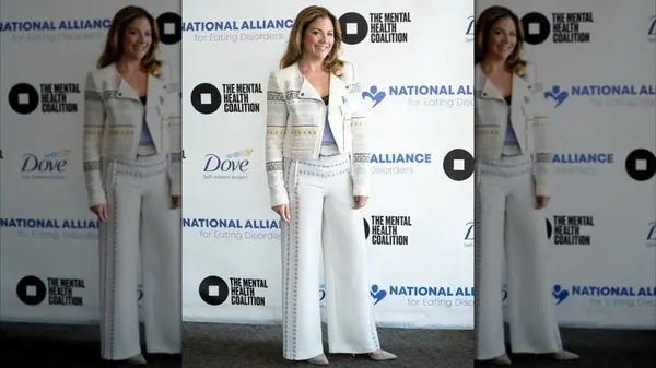 Sophie Grégoire Trudeau in a white jacket and white pants at an event