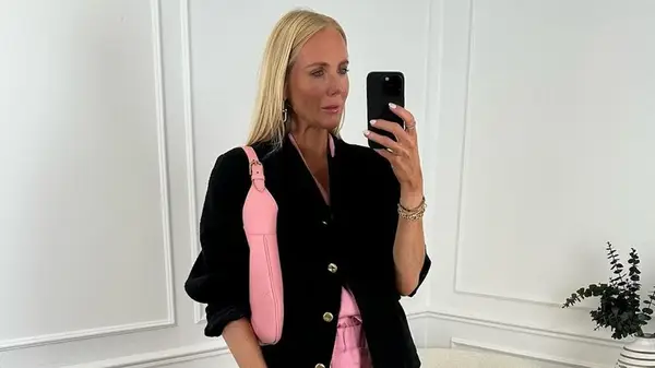 Woman wearing pink and black