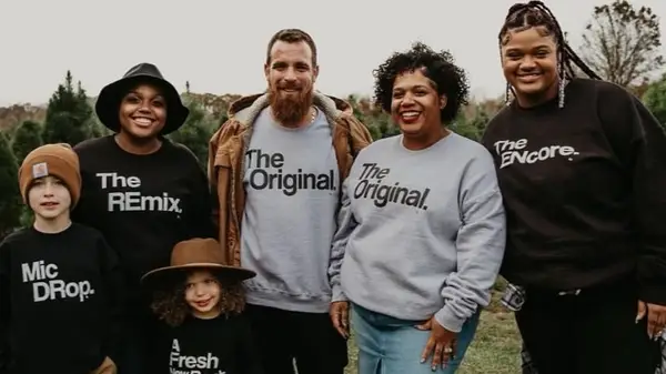 A family wearing Kaans Designs T-shirts