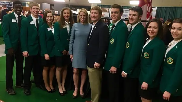 Pam Bondi in a blue dress