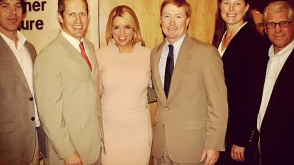 Pam Bondi in a nude dress