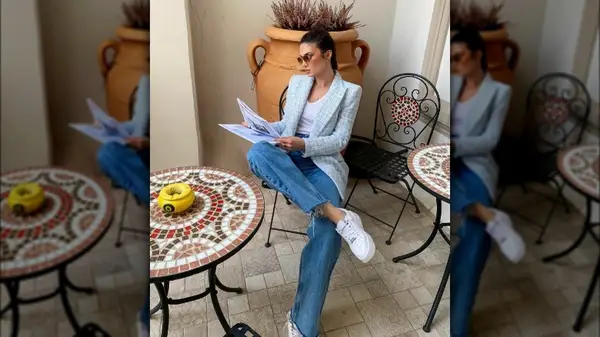 woman reading newspaper