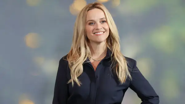 Reese Witherspoon in a black shirtdress