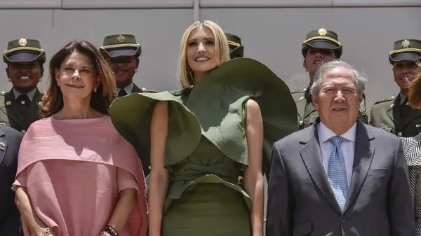 Ivanka Trump wearing a green dress with billowing sleeves in Colombia in 2019